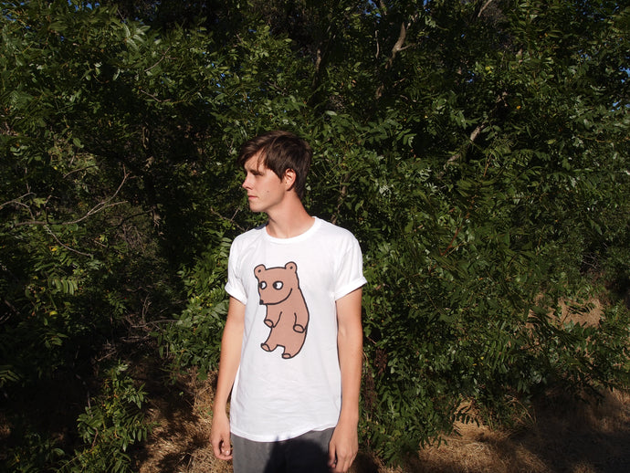 Swedish Boy Dennis wearing Abducted Bear Tee Shirt in White in Corral Canyon Malibu