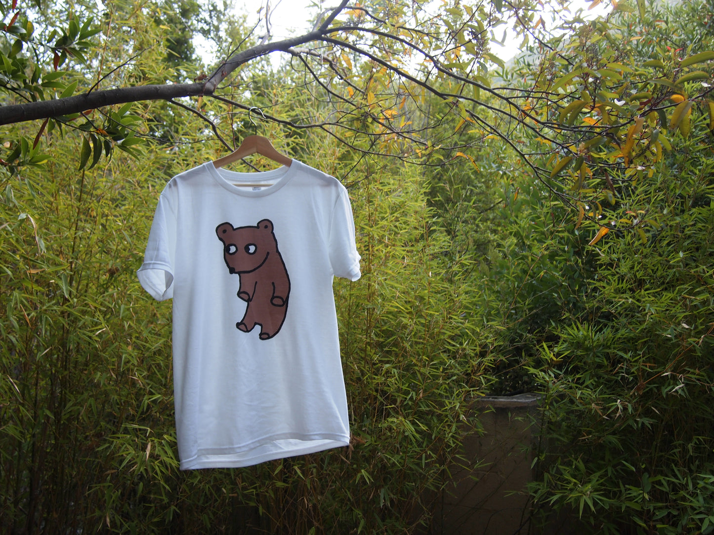 Abducted Bear Tee in White hanging from Tree in Corral Canyon Malibu